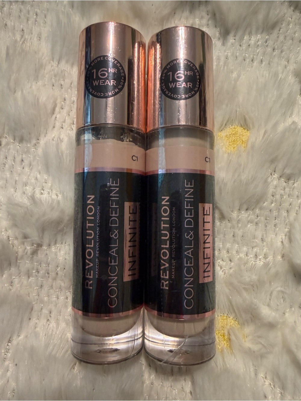 Revolution Conceal & Define Infinite Liquid Concealer in Nude with Rose Gold Cap